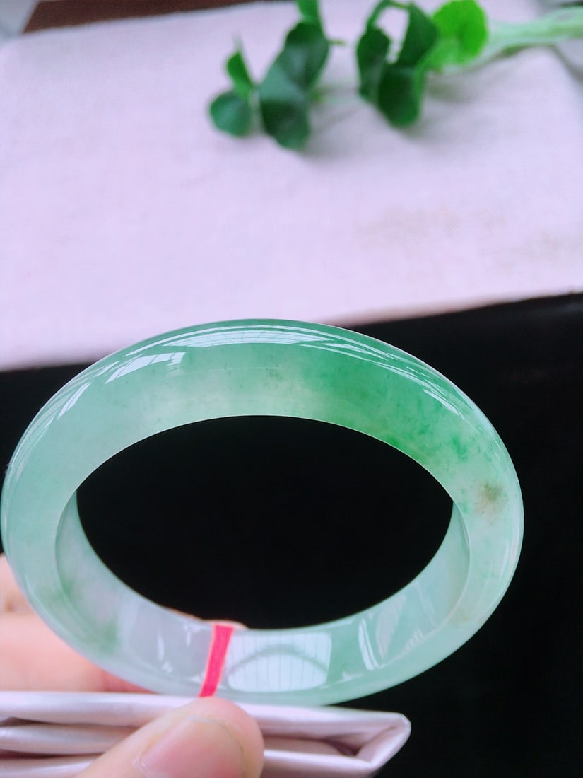 Natural jadeite Bracelet: This bracelet showcases the captivating beauty of ice jadeite, renowned for its watery luster and crystal-clear texture. The exquisite craftsmanship captures the essence of nature's artistry, giving t