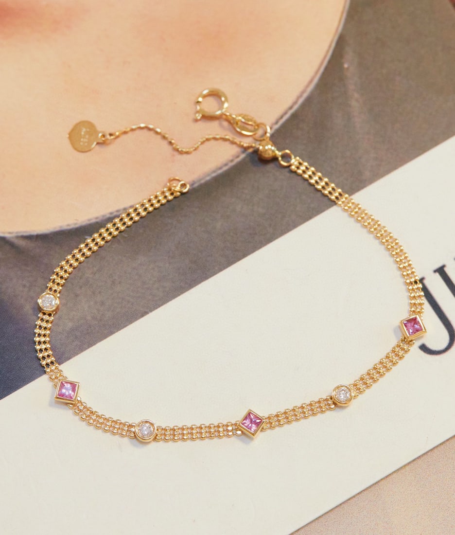 18k gold diamond and colored gemstone bracelet: 18k gold diamond and colored gemstone bracelet