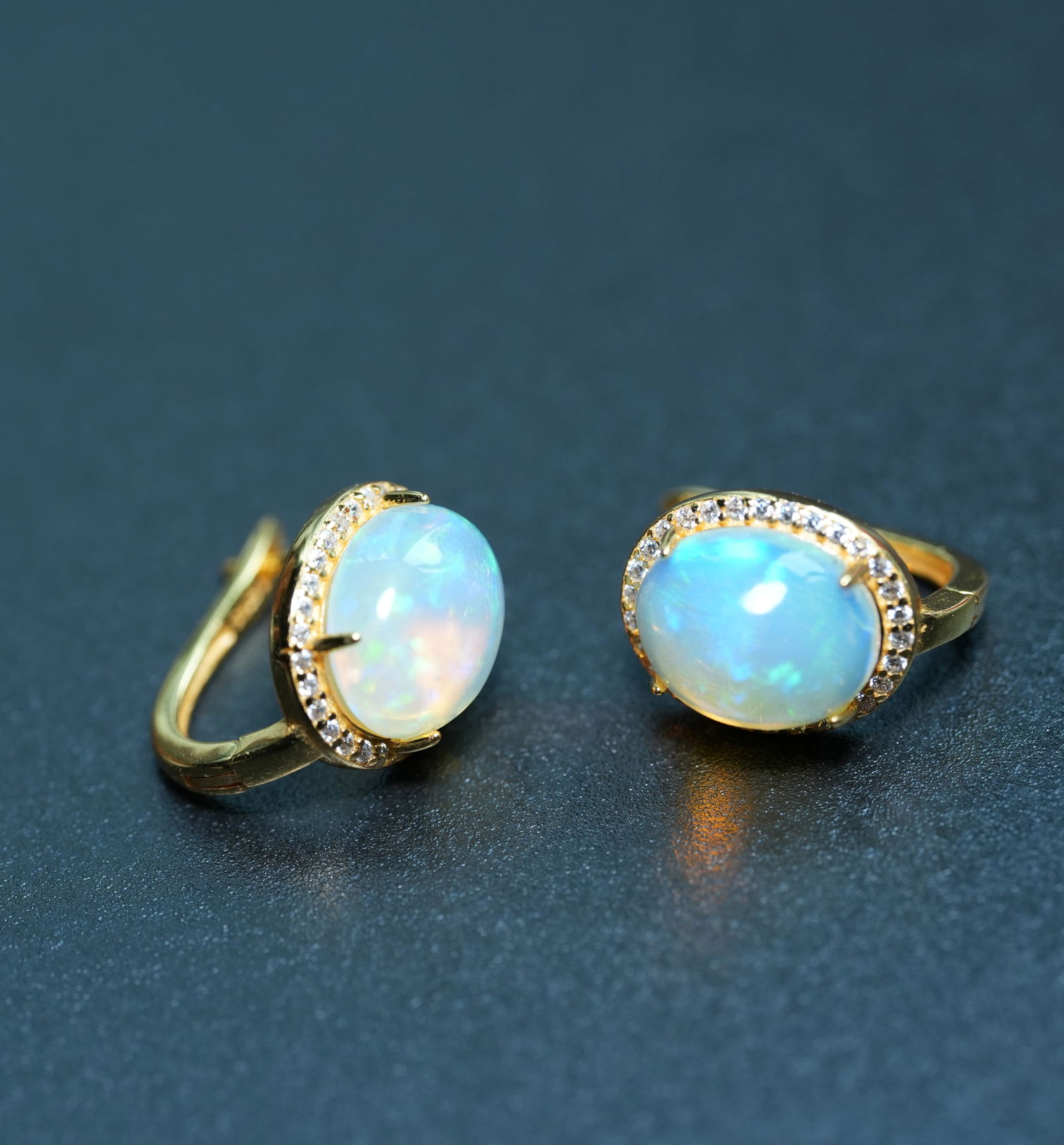 S925 Sterling Silver Earrings Set with Natural Opal: S925 Sterling Silver Earrings with Natural OpalThese earrings are crafted from S925 sterling silver with gold plating, resulting in a delicate texture and warm luster. They are comfortable to wear and