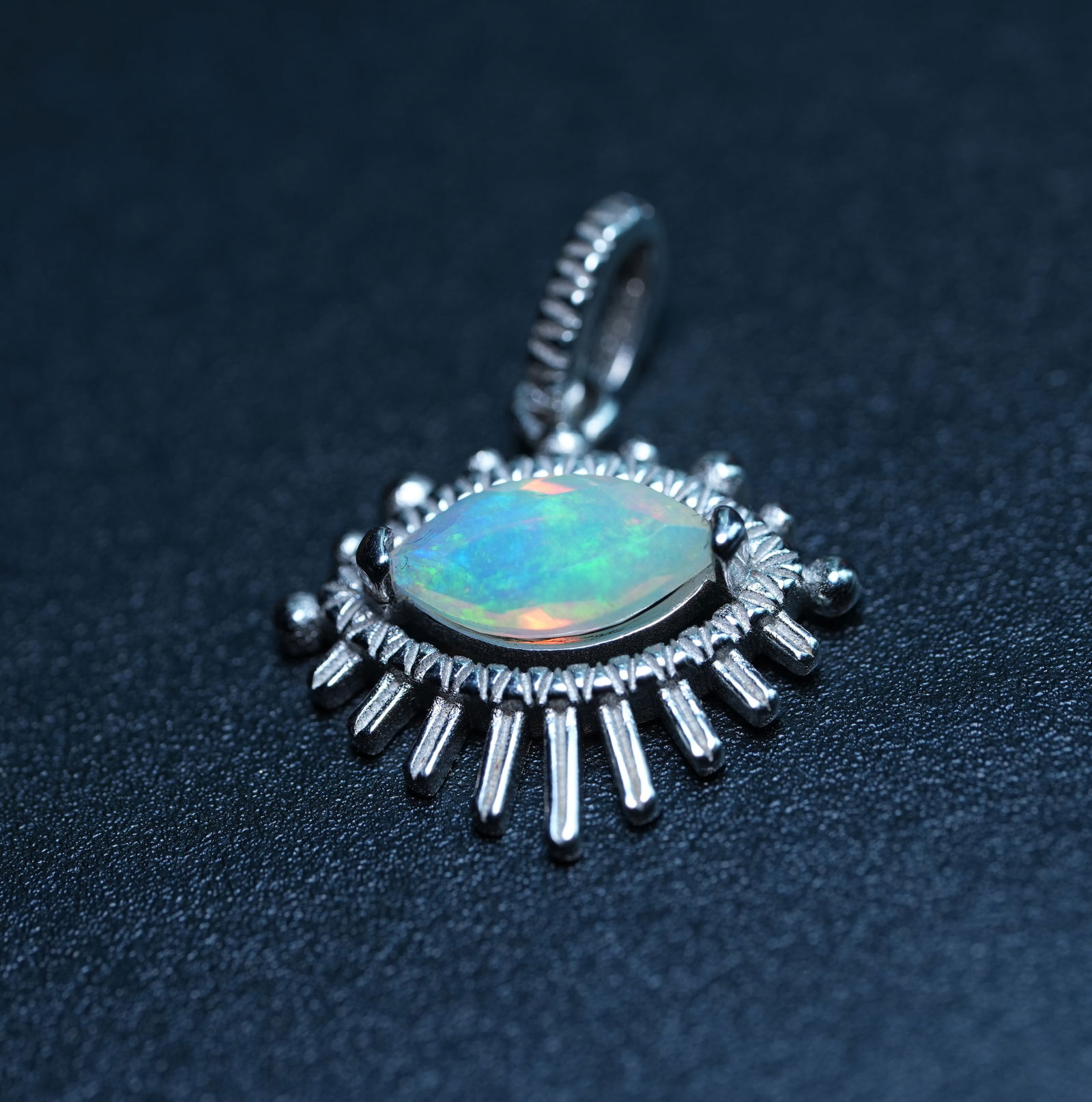 925 Sterling Silver Natural Opal Pendant: This natural opal pendant features an ingenious design: the main stone is an oval-shaped natural opal with a clear, light-colored base and a surface that displays iridescent colors of blue, green, and