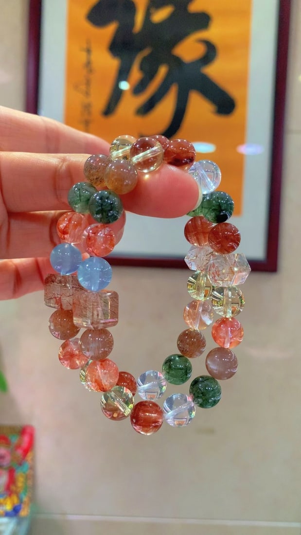 Crystal Multicolor Fortune Bracelet: This bracelet captures the essence of prosperity and harmony with its rich and colorful crystals. The lush green aventurine and red rabbit hair emit a vibrant energy, while the black gold super cubes