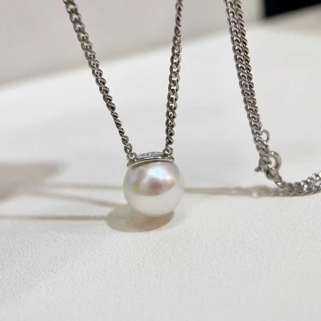 Sterling Silver Freshwater Pearl Necklace: This necklace perfectly combines the classic design of the Cuban link with the elegant relaxed feel of pearls, presenting a durable and stylish beauty. The 12-13mm freshwater Edison pearls are bright