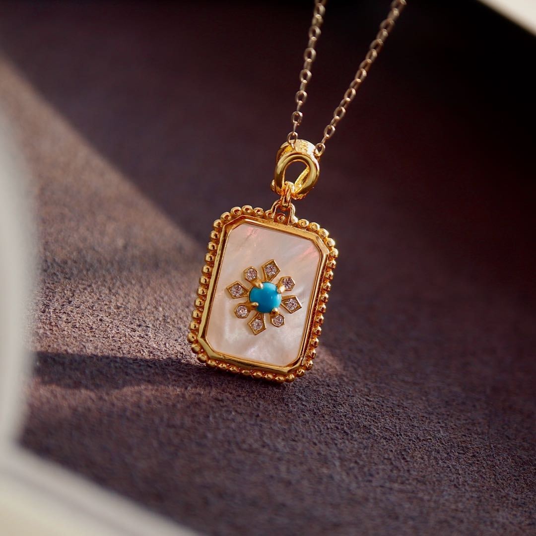 925 silver deep sea mother of pearl pendant: This pendant is carefully inlaid with deep-sea mother-of-pearl on 925 sterling silver, showcasing a simple yet sophisticated beauty. The high-quality Sleeping Beauty turquoise selected gives this