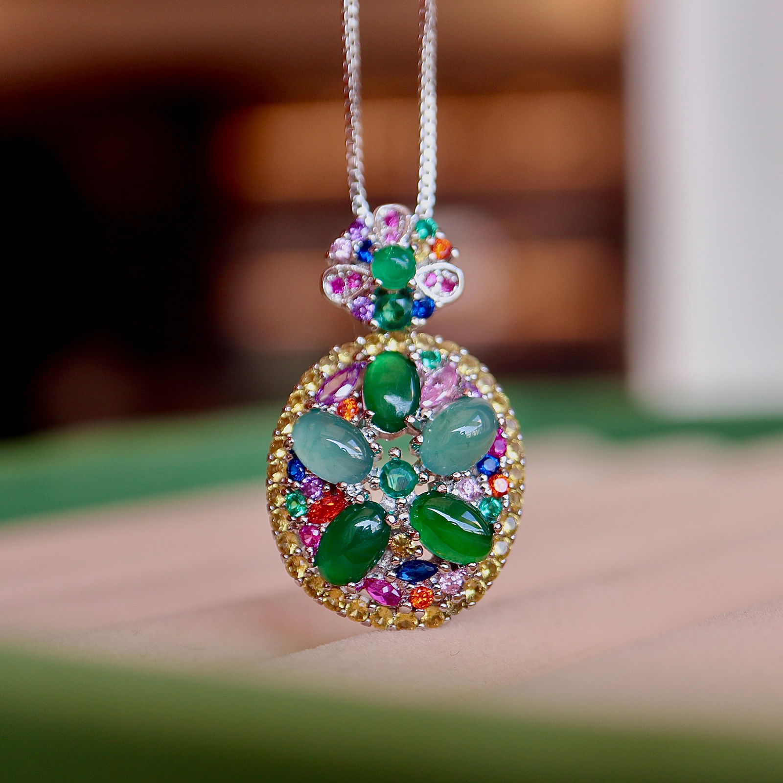 Jadeite Pendant: This natural Jadeite pendant showcases a dazzling array of dopamine candy colors. Its elegant and sophisticated design resembles high-end styles, adorned with cultivated rubies, emeralds, amethysts, a