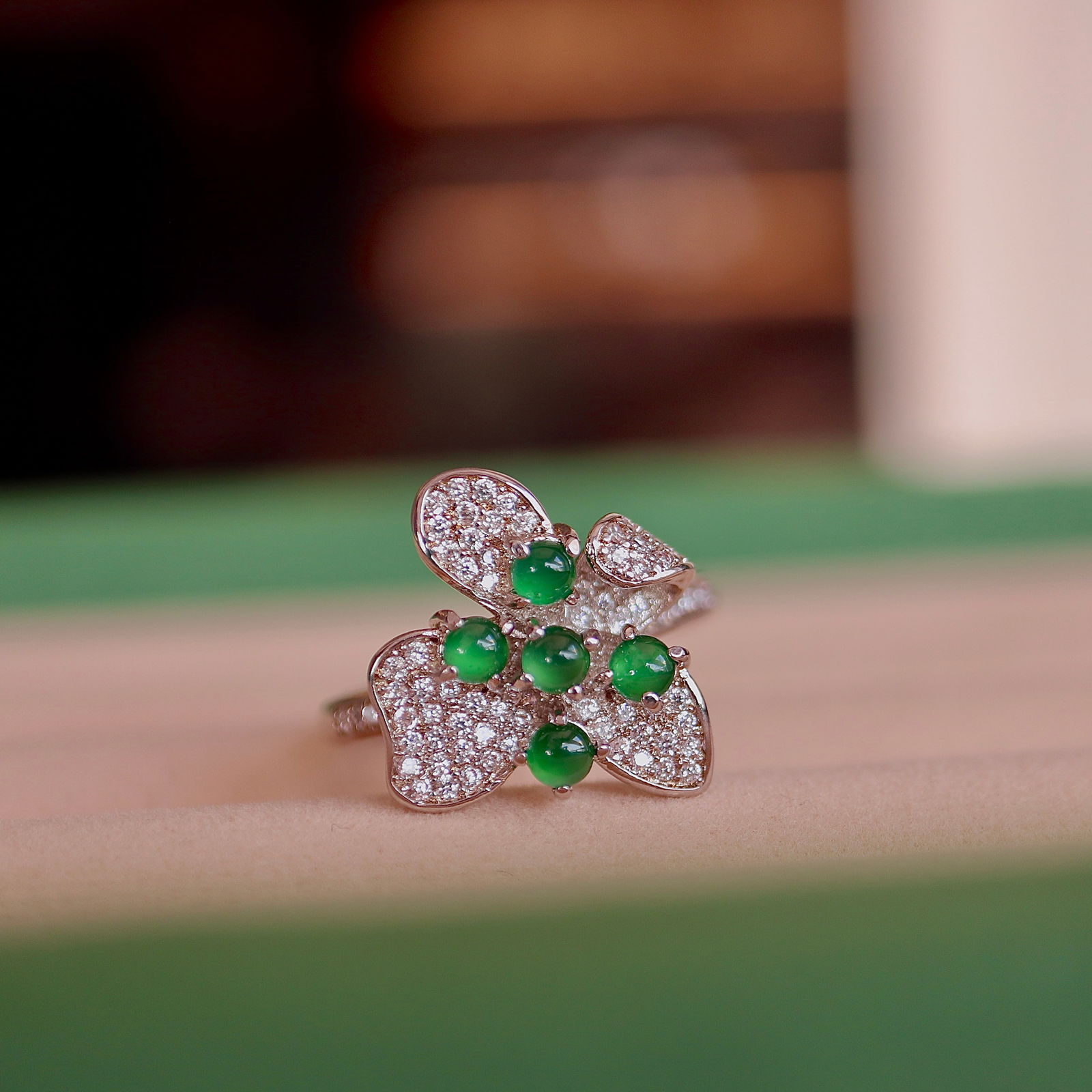 Jadeite ring: This ring features a natural Jadeite as the main stone, presenting a deep green color, as if the essence of nature is condensed at your fingertips. The luxurious inlay design makes this ring more