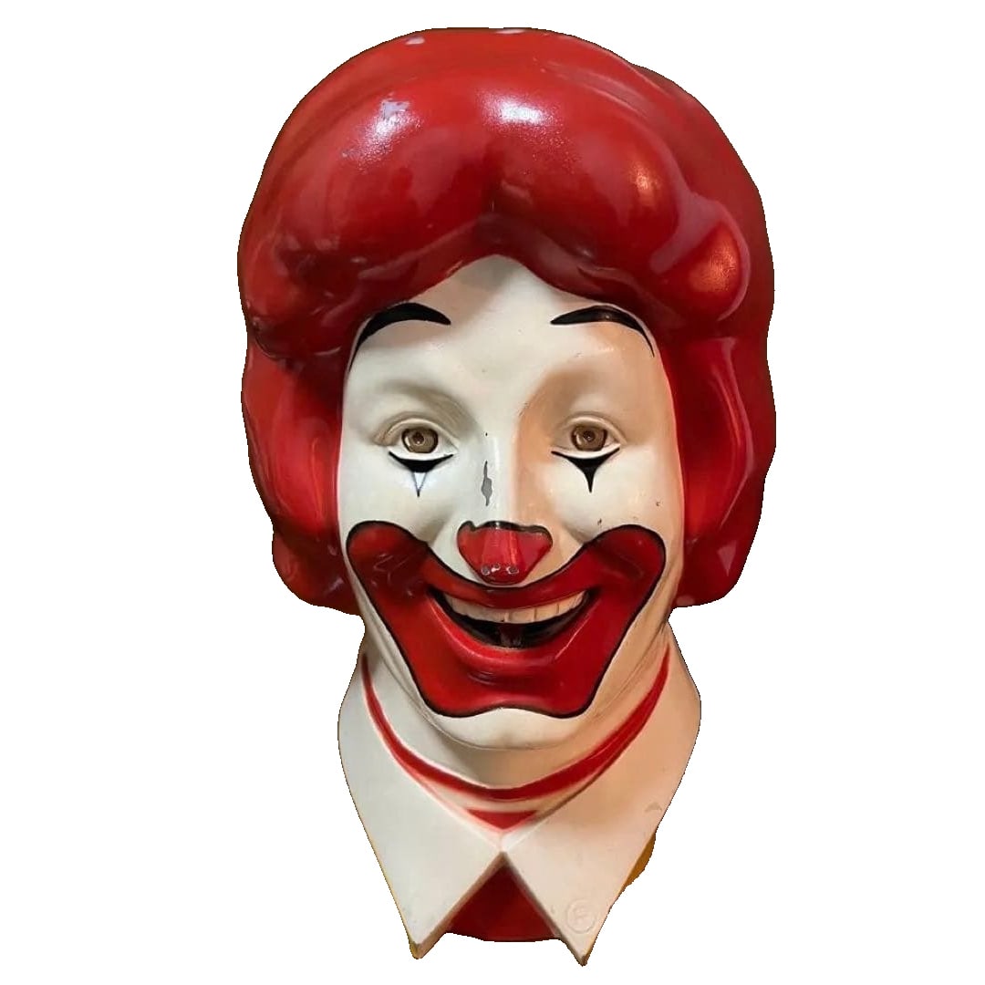 1977 Ronald McDonald Head Store Display Sign: A rare 1970s Ronald McDonald helium tank head display, featuring the harder-to-find collared version. This is a large and impressive piece that makes a strong visual impact. Despite its age, it