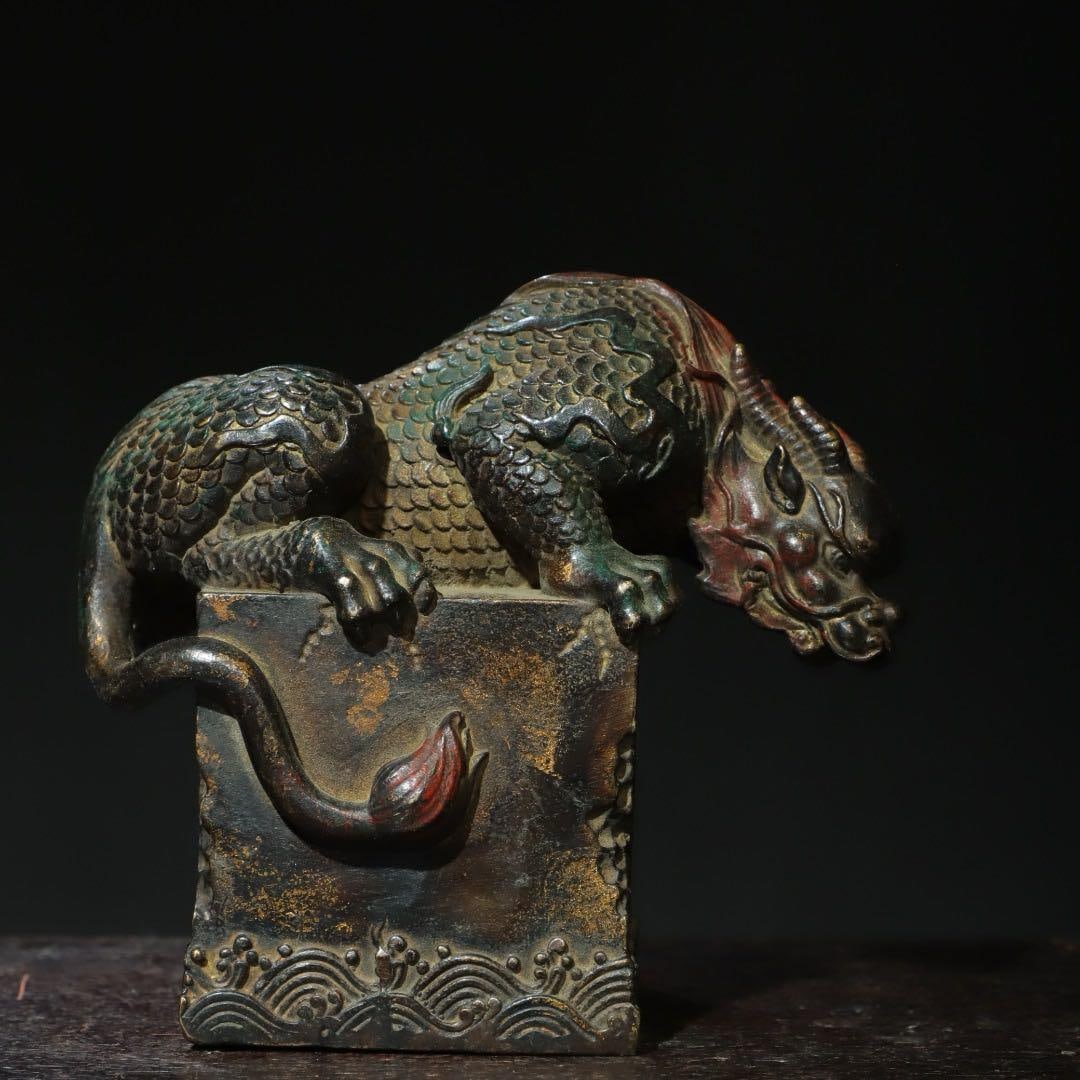 Antique Pure Copper Mythical Beast – Qing Dynasty: An antique pure copper sculpture from the Qing Dynasty period, depicting a seated mythical beast. Traditionally used as a protective talisman or scholar’s desk ornament. Dimensions Height: Approx.