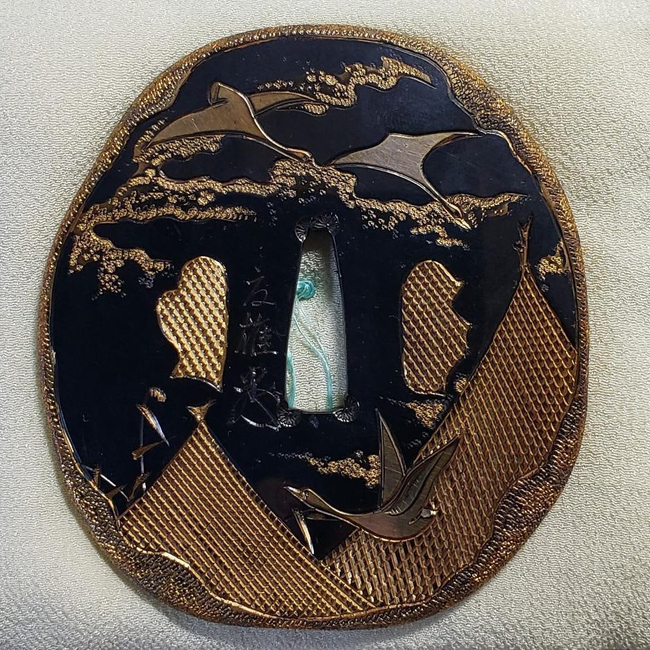 Kano Natsuo Jingo Sakura Viewing Moon Tsuba: An outstanding masterwork tsuba (sword guard) signed by Kano Natsuo, titled Jingo Sakura Viewing Moon. The craftsmanship is refined and elegant, making it a highly impressive example of Meiji-period