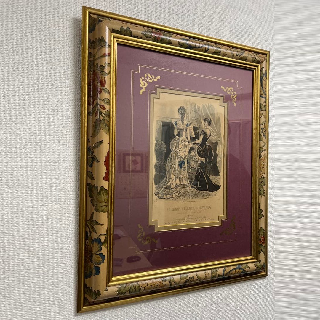 Antique Framed Victorian Fashion Plate: A rare framed fashion illustration from the Spanish periodical LA MODA ELEGANTE ILUSTRADA. This piece showcases elegant Victorian-era women's fashion in exquisite detail. Technique: Engraving with