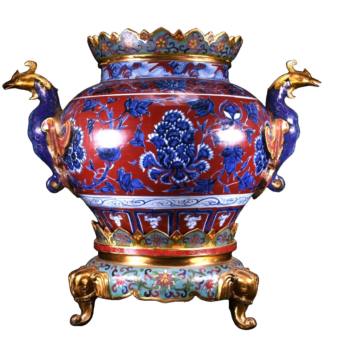 Blue and white porcelain with red glaze, entwined branches and peony patterns, inlaid with cloisonnE: Blue and white porcelain with red glaze, intertwined branches and peony pattern, inlaid with cloisonnE enamel double phoenix vessel. The shape of the vessel is solemn and heavy, covered with blue and