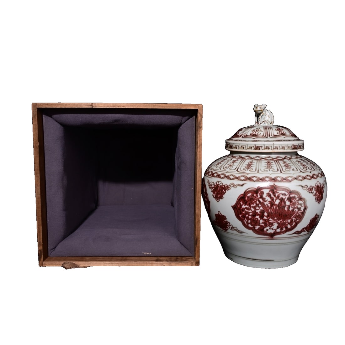 Yuan Dynasty copper-red glazed phoenix-patterned lidded jar: This Yuan dynasty underglaze red phoenix pattern lidded jar features a dignified and elegant shape, with a warm and lustrous glaze throughout the body. The glaze is thick, transparent, and the