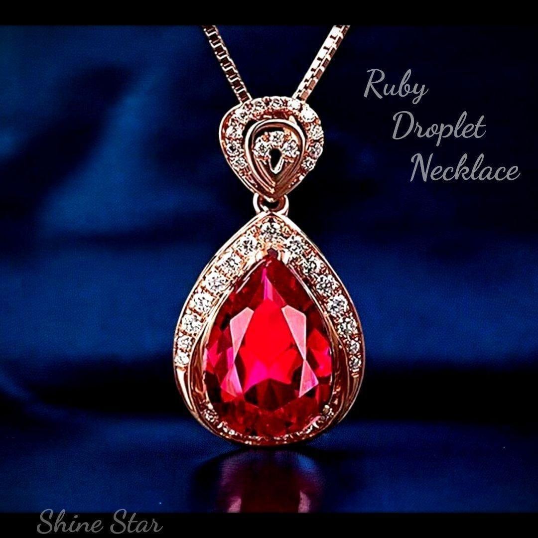 (Second-hand) Ruby, teardrop-shaped diamond, pink gold necklace, brand new, unused: Ruby, teardrop-shaped diamond, rose gold necklace, brand new unused, red, 925 silver A necklace featuring a large, ruby-like gemstone in a beautiful deep red color. Designed in a teardrop shape,