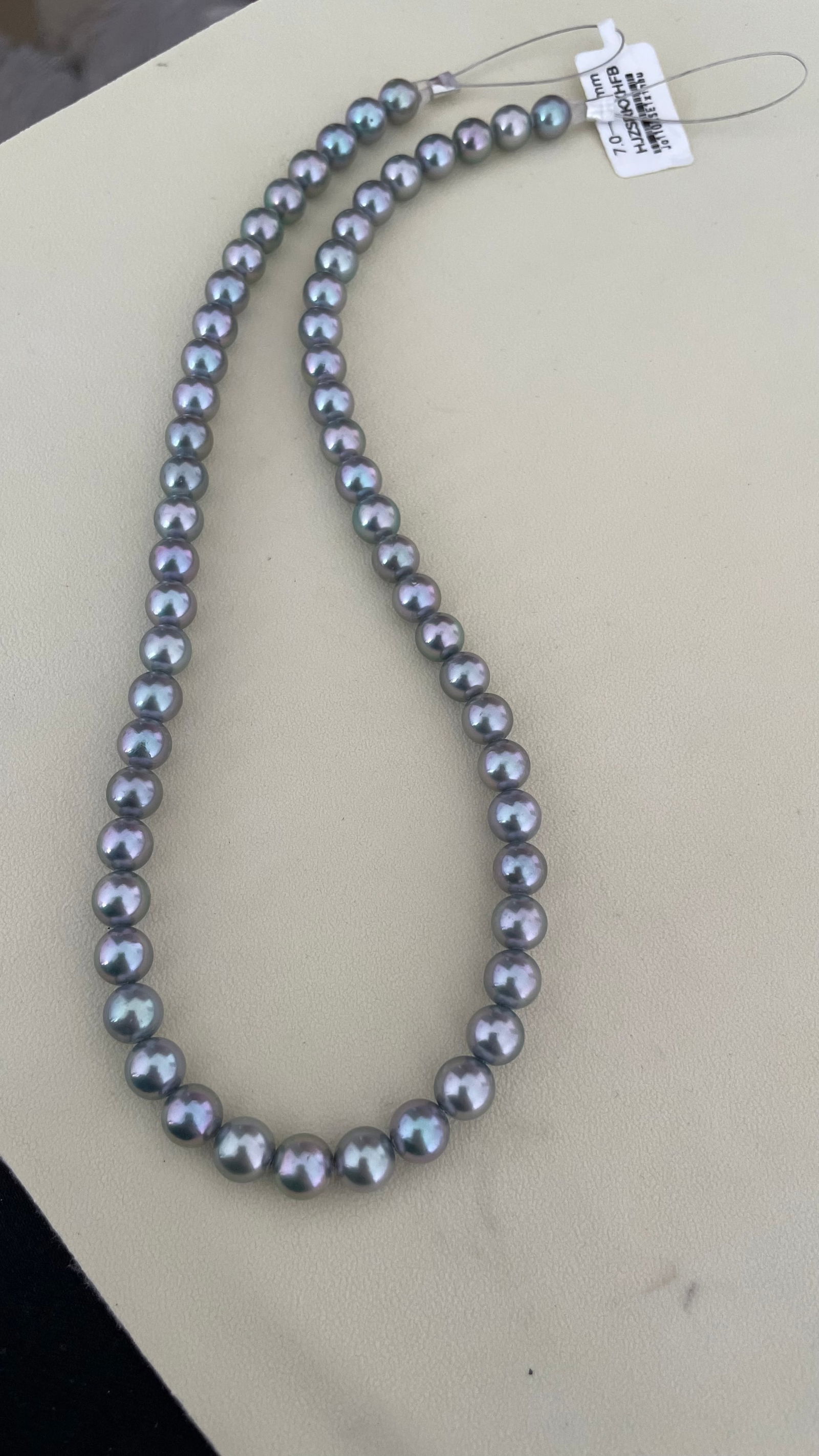 Akoya Pearl Necklace: This necklace showcases the exquisite beauty of Akoya pearls, renowned for their lustrous sheen and delicate elegance. The pearls, measuring between 7 to 7.5 mm, are nearly perfectly round with an