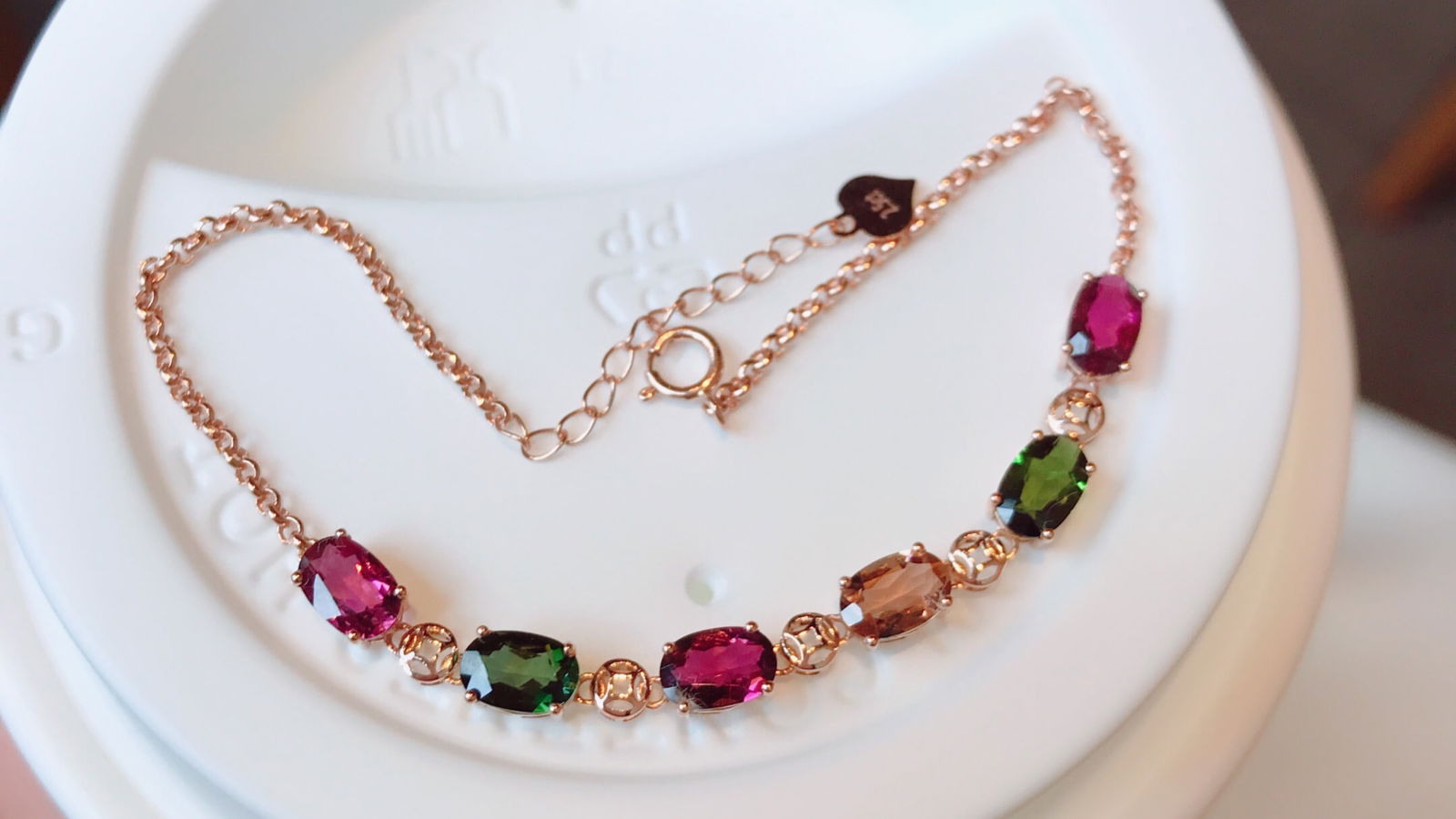 18K Gold Tourmaline Bracelet: This bracelet is a masterpiece of elegance, crafted from luxurious 18K gold and adorned with a stunning natural tourmaline. Its high clarity and exquisite craftsmanship make it a versatile accessory