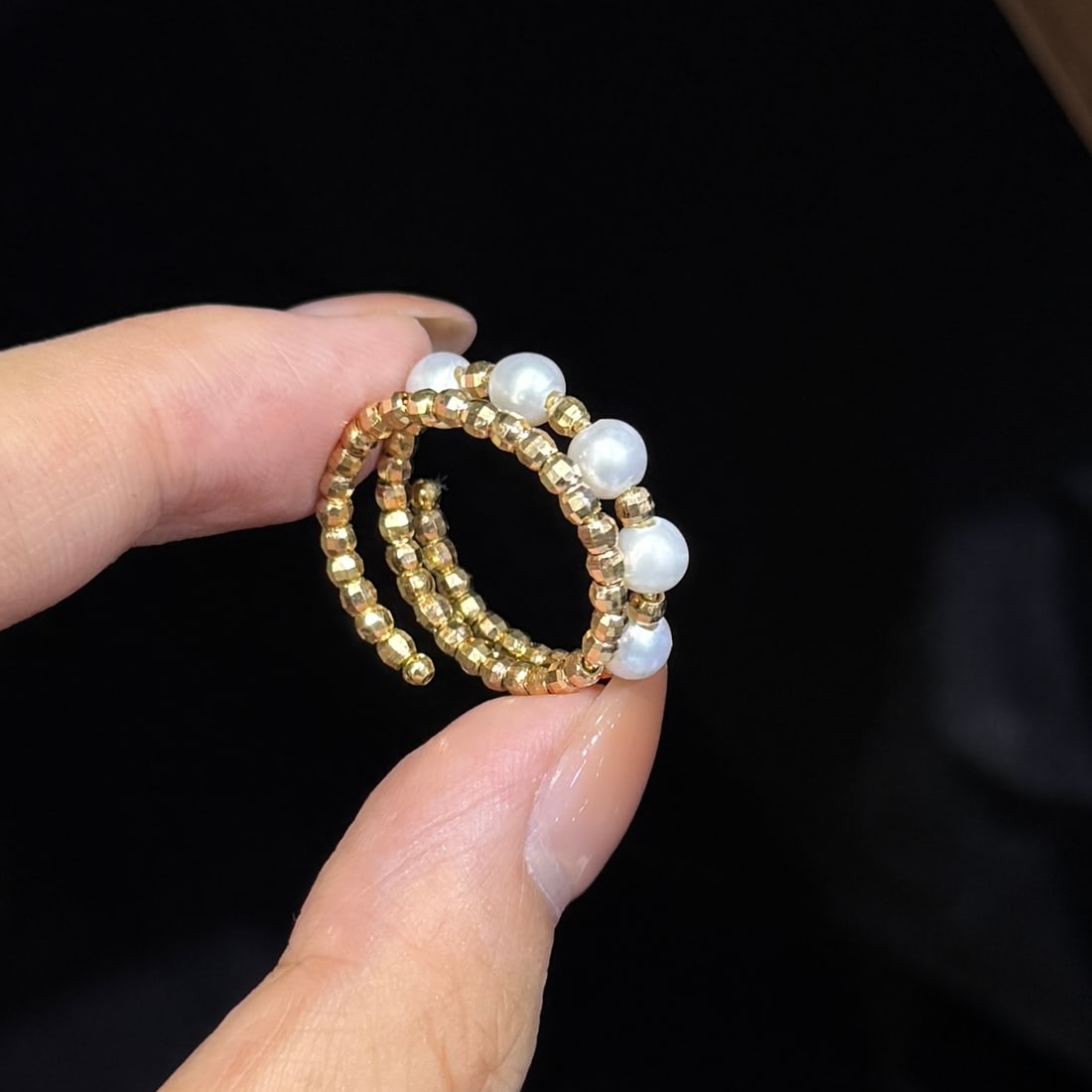 Natural Pearl Ring: This exquisite ring features a stunning display of near-flawless, high-quality freshwater pearls, each measuring a perfect 4-5mm in diameter. The classic laser bead design is elegantly versatile, maki