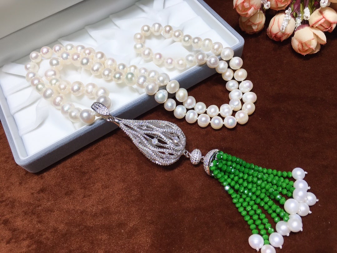 Natural Pearl Necklace: This pearl necklace exudes a powerful aura, perfect for those who wish to make a statement. Crafted with near-round freshwater white pearls, it captures the essence of elegance and sophistication. The