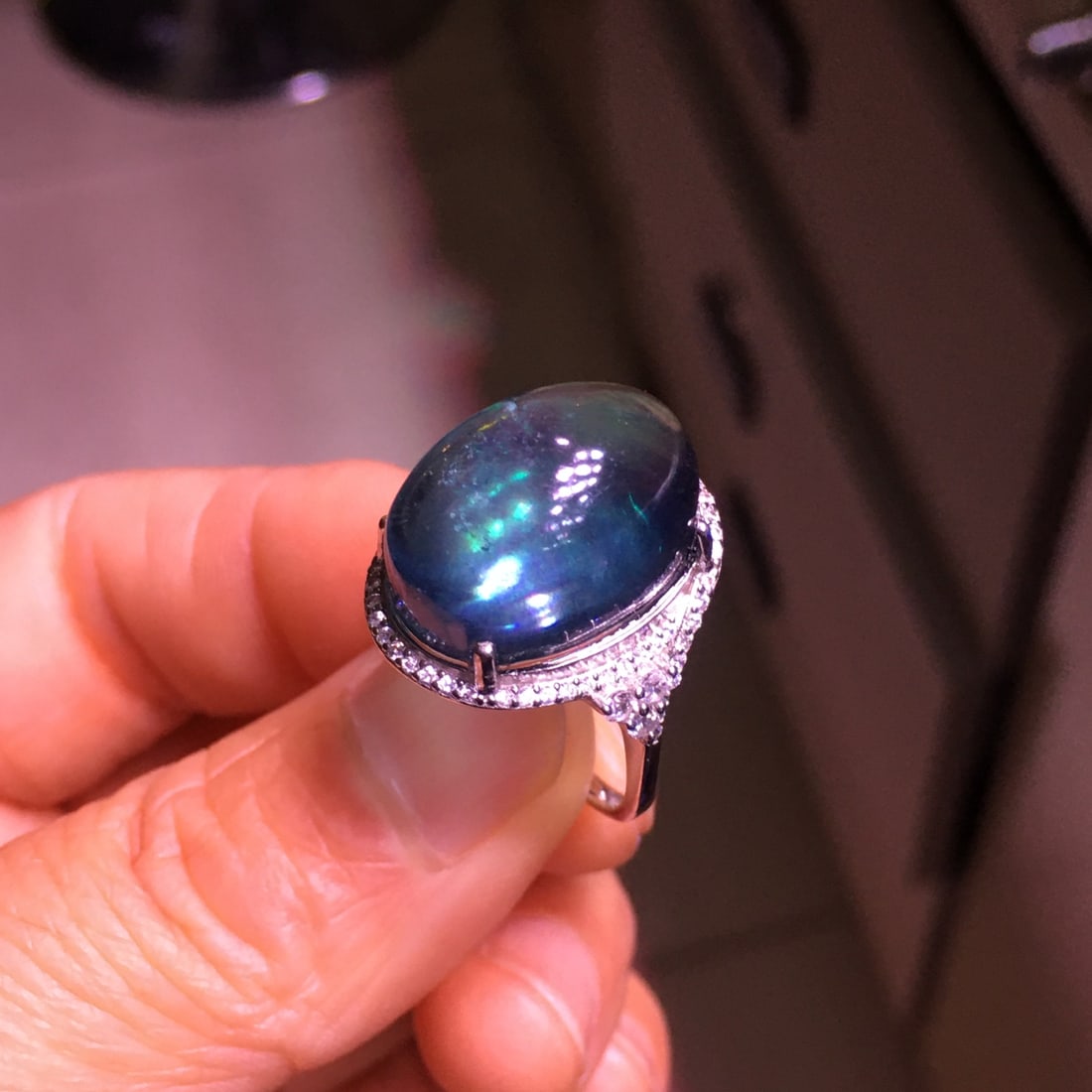 Silver Aquamarine Cabochon Ring: This Silver Aquamarine Cabochon Ring captivates with its crystal-clear transparency and enchanting devilish green hue. The cabochon cut magnifies the stone's natural allure, making it a versatile