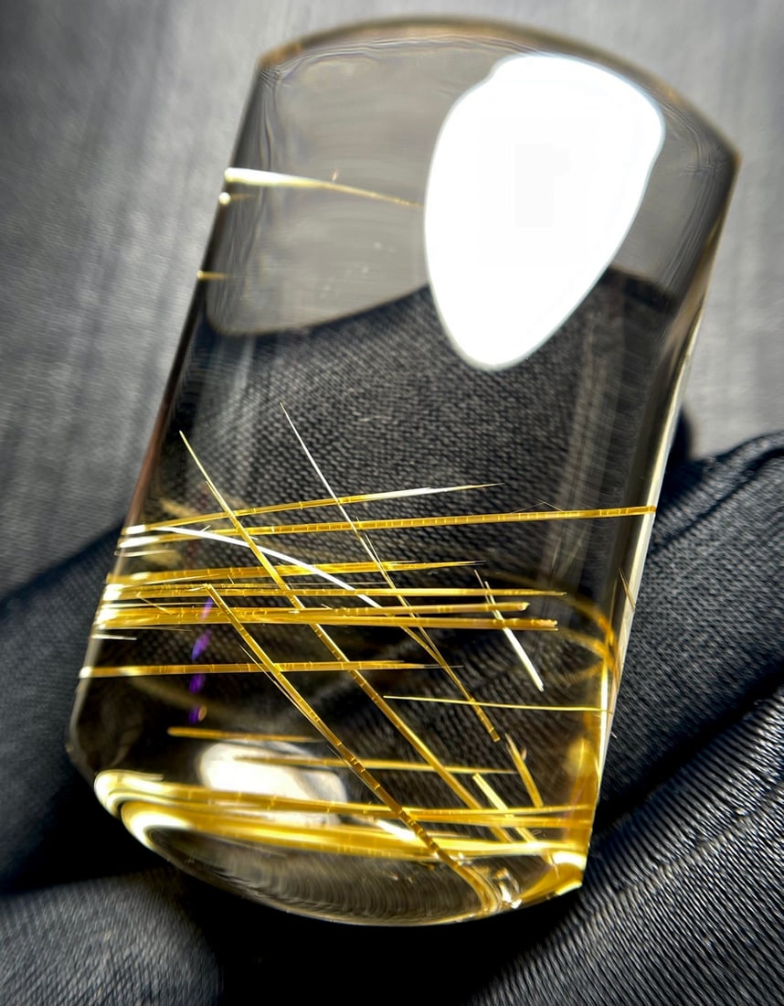 Titanium Crystal Pendant: This pendant showcases the mesmerizing allure of natural titanium crystal, with its transparent body and striking white titanium crystal threads. The coarse and orderly strands exude a sense of sophis