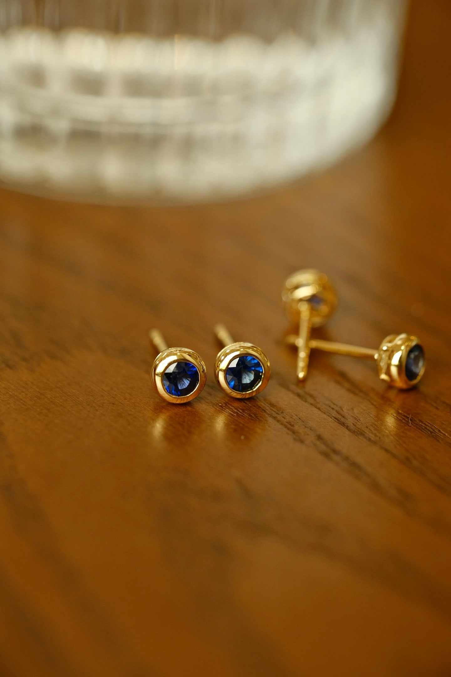 18K Gold Sapphire and Ruby Earrings: This pair of 18K Gold Sapphire and Ruby Earrings captures the essence of elegance and versatility. Featuring natural royal blue sapphires and pigeon blood red rubies, these earrings are a testament