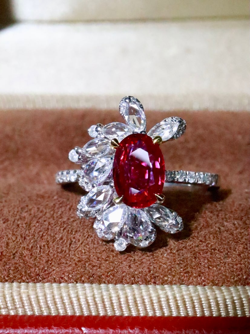 18K Gold Ruby Ring: This 18K Gold Ruby Ring is a true testament to timeless elegance and high-quality craftsmanship. The stunning ruby, free from any enhancements, captures the heart with its natural beauty and vivid all