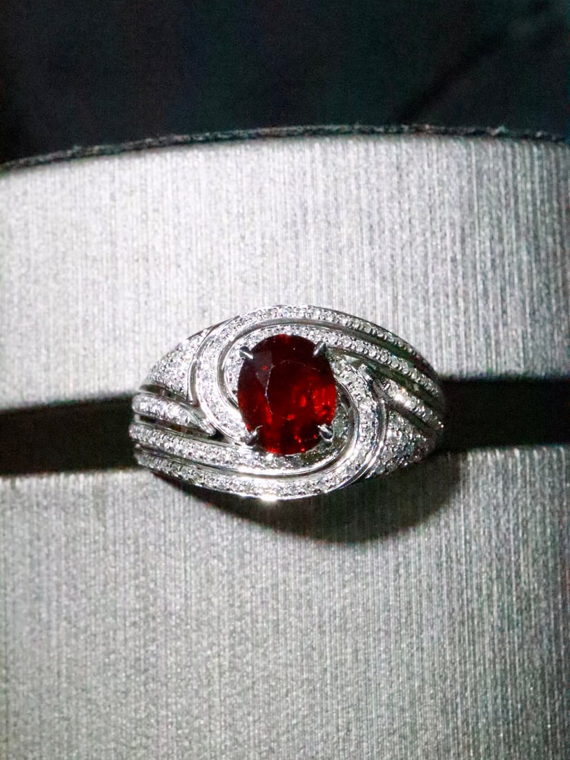 18K Gold Ruby Ring: This 18K Gold Ruby Ring is a masterpiece that exudes an unparalleled sense of vintage charm and sophisticated design. The ring features a captivating main stone that boasts a rich and pure pigeon bloo