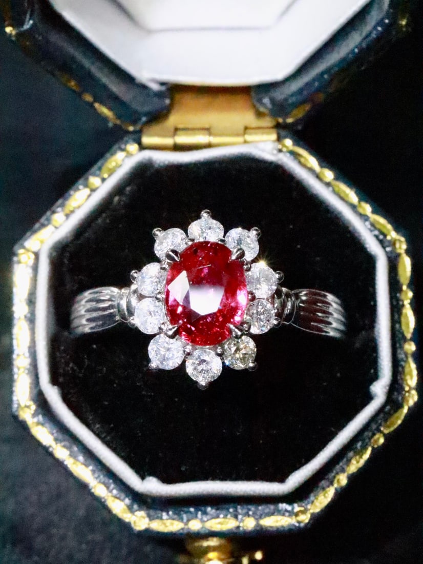 PT950 Platinum Ruby Ring: This platinum ruby ring captivates with its fiery, flame-like allure, while offering a gentle and delicate sheen. The intriguing contrast imbues the piece with a vibrant vitality from within, making i