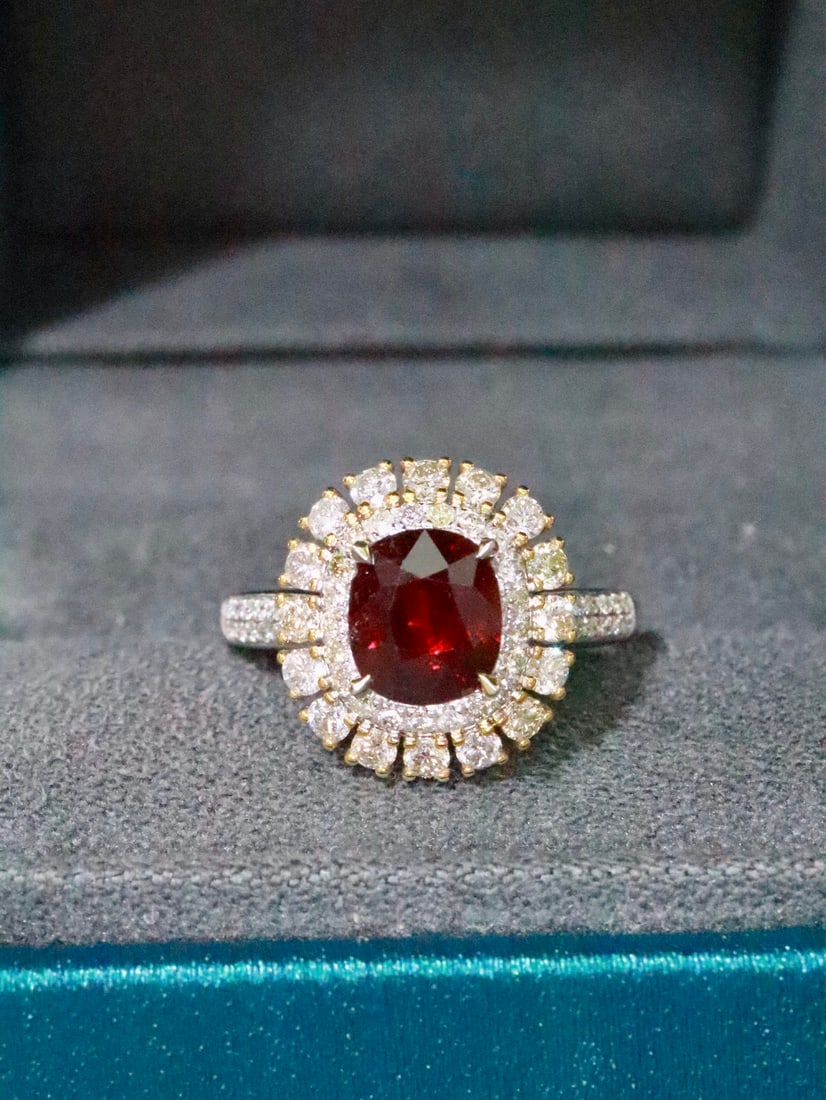 18K Gold Ruby Ring: This 18K Gold Ruby Ring is a breathtaking masterpiece that leaves one speechless with its elegance. The ring features a magnificent pigeon blood red hue that exudes sophistication and enhances the wea