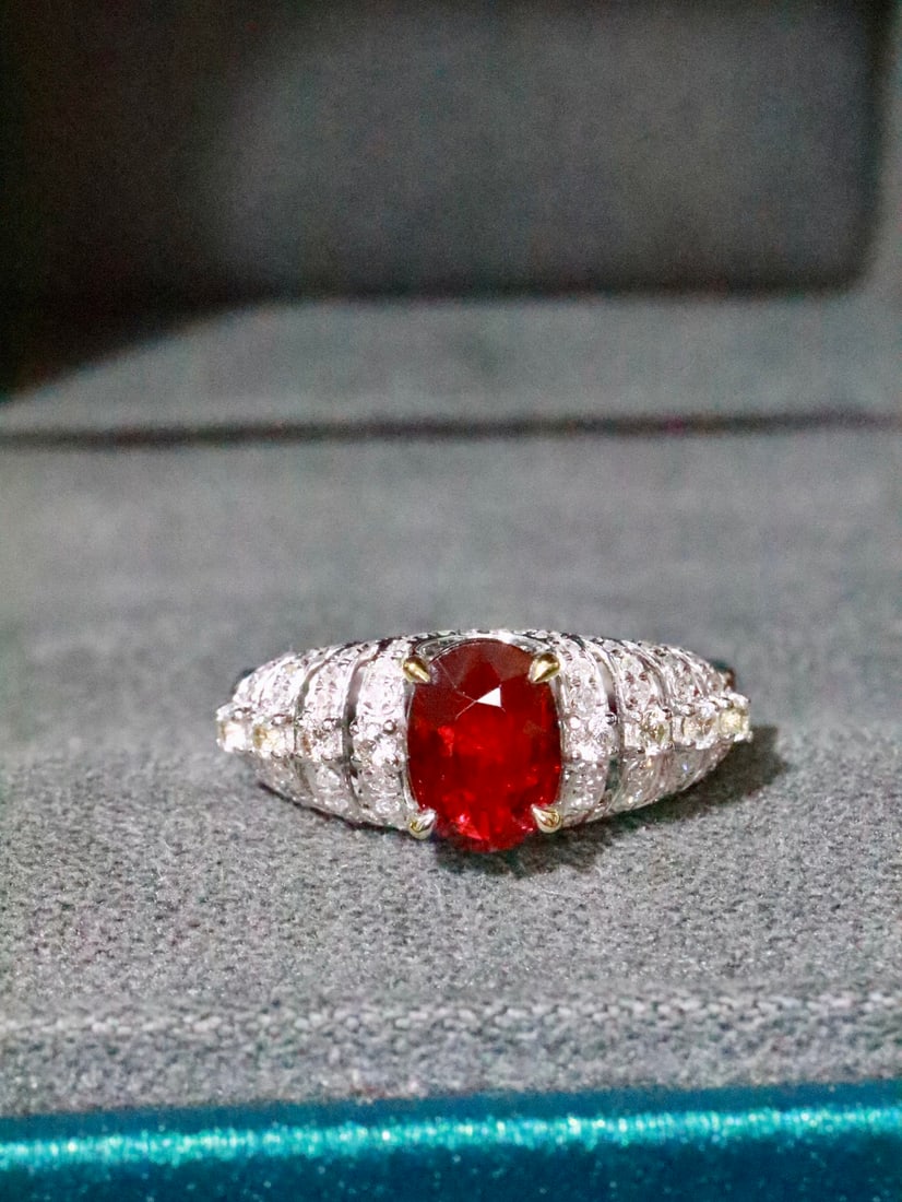 18K Gold Ruby Ring: This 18K Gold Ruby Ring exudes an aura of elegance with its exquisite craftsmanship. The vibrant hue of the unheated ruby captivates with its rich and vivid color, reflecting a timeless beauty that en