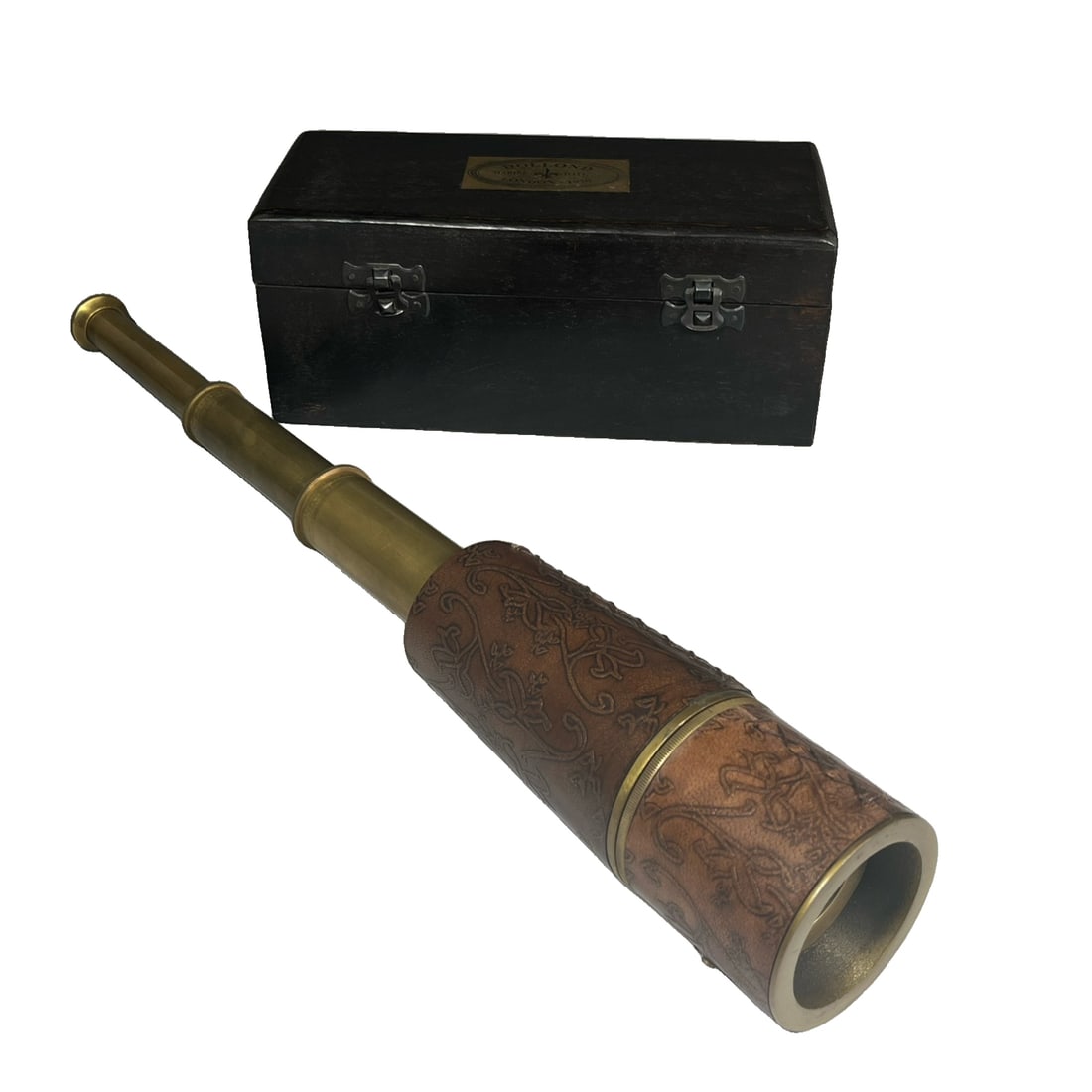 Telescope in a redwood box: Rosewood boxed refracting telescope, all items intact and in normal working condition. Diameter of 6 centimeters, fully extended length of 48 centimeters. Weighs 838 grams.