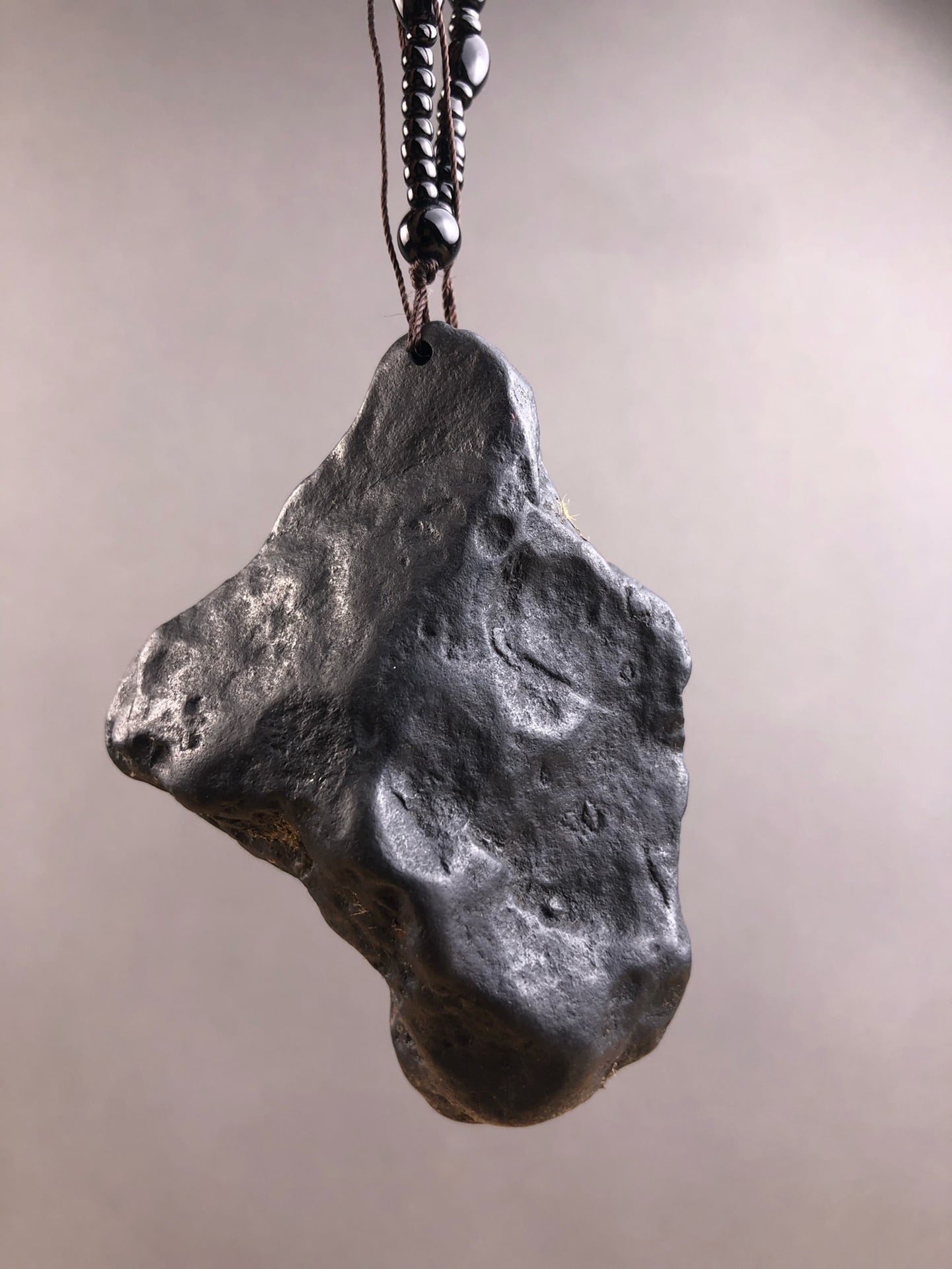 One meteorite pendant. - 2