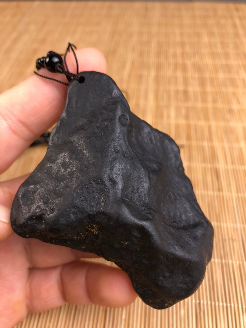 One meteorite pendant. - 8
