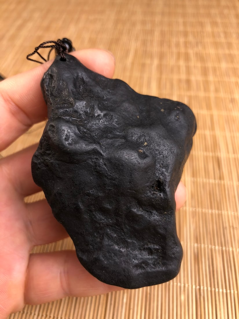 One meteorite pendant. - 9