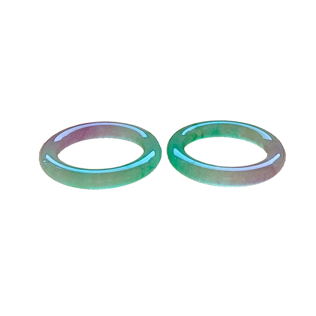 A pair of jade bracelets. (1 of 9)