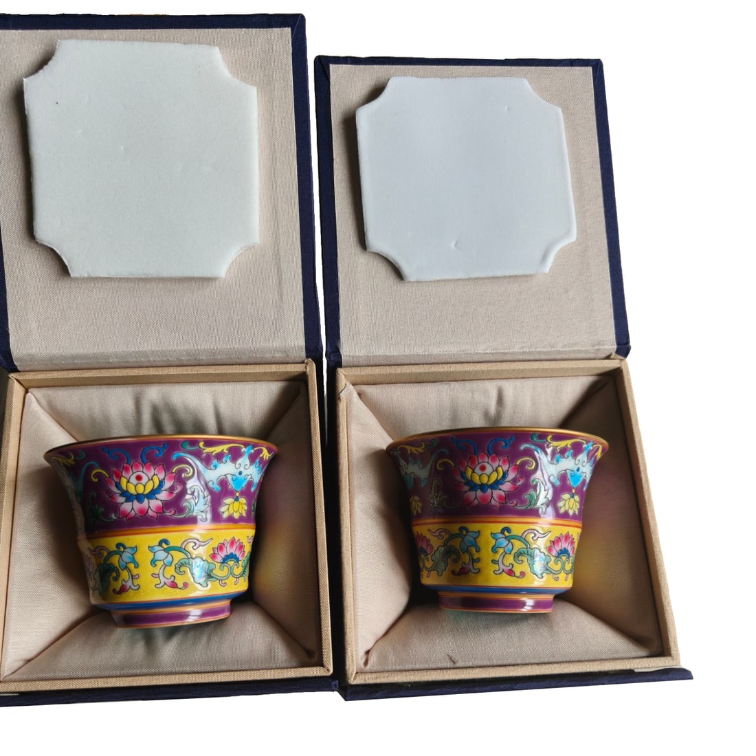A pair of Qianlong period enamel cups from the Qing Dynasty.: A pair of Qianlong period enamel cups from the Qing Dynasty, with each cup measuring 5.9x7.7 centimeters.
