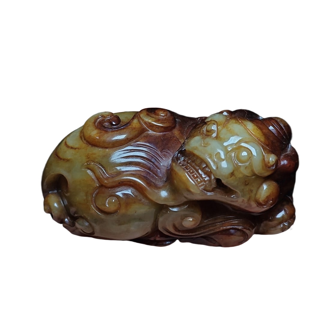 Hetian jade carving auspicious beast handle piece: Hetian jade carving of a mythical beast handle, details as shown in the picture. Size 8x4 cm, weight 234.5 grams.