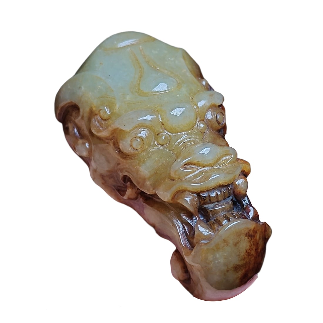 Hetian jade carved dragon handle piece: Hetian jade carved dragon handle piece, good quality jade, exquisite carving details as shown in the picture. Dimensions 7.5x4 centimeters, weight 146 grams.