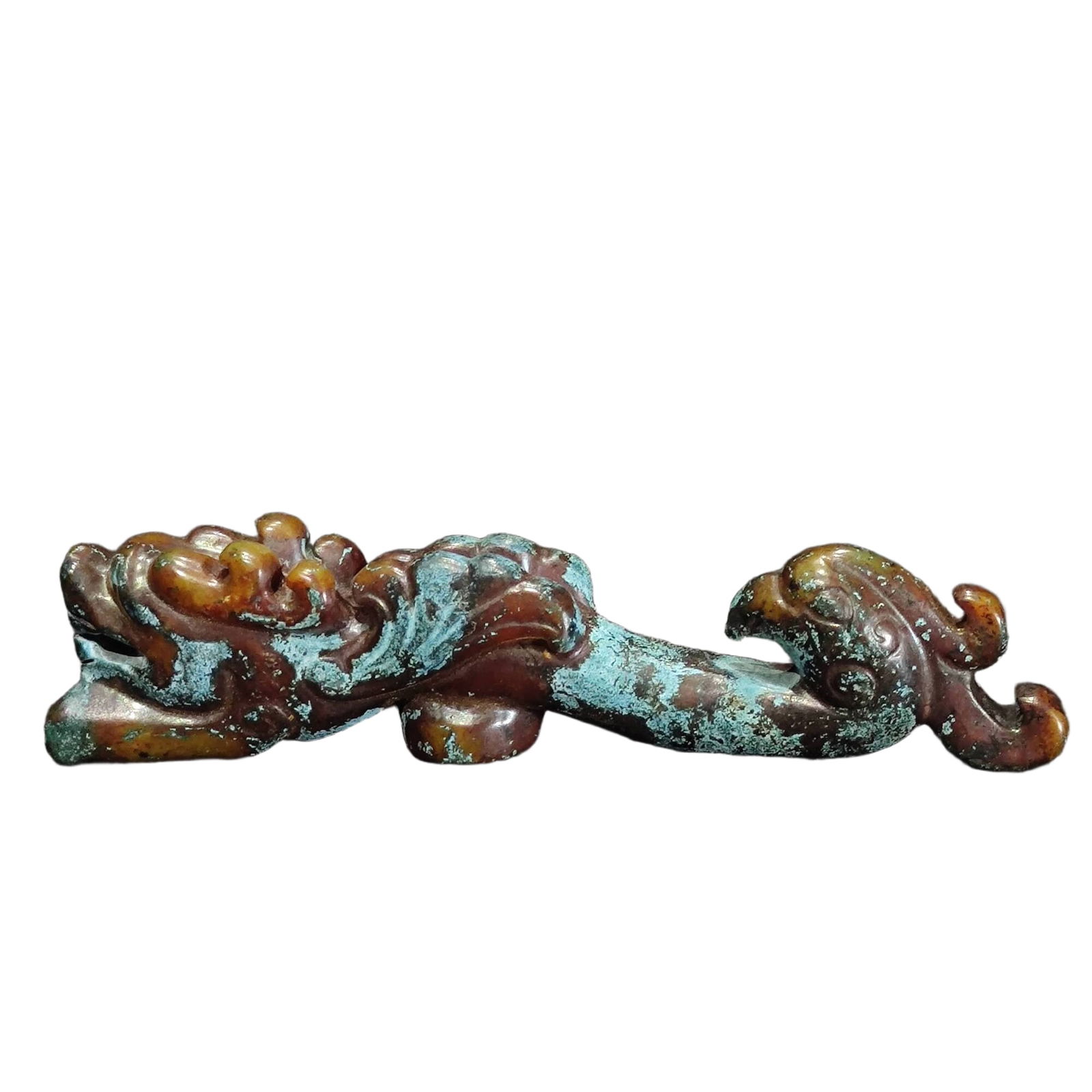 Ancient Jade Dragon Hook: This ancient jade dragon hook has an elegant and refined design, with the dragon's body twisting like flowing clouds and water, showcasing the superb carving skills of ancient craftsmen. The dragon