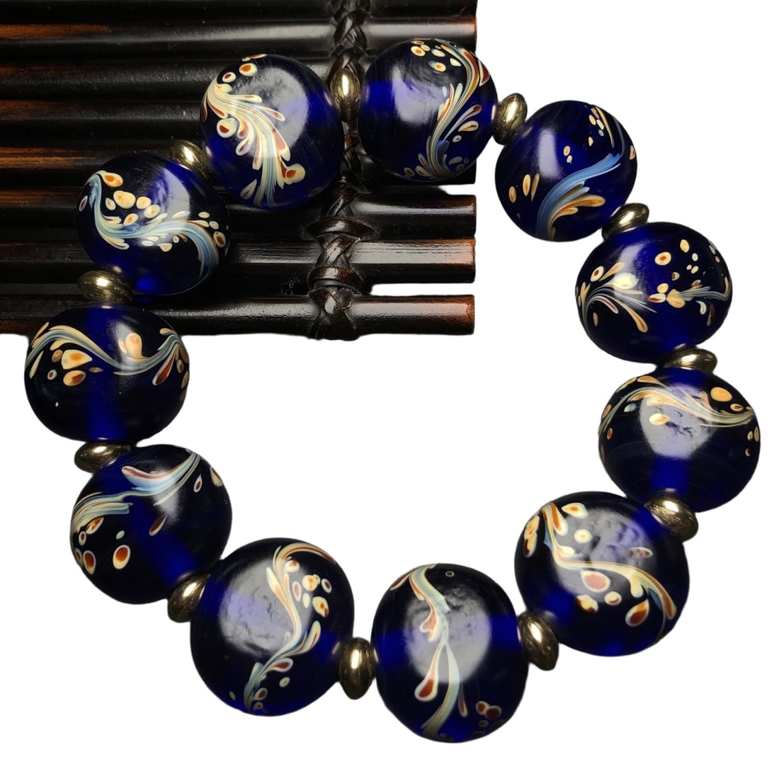 Old Glass Phoenix Tail Bracelet: Old Glass Phoenix Tail BraceletSize: about 21x14mm with 11 beads