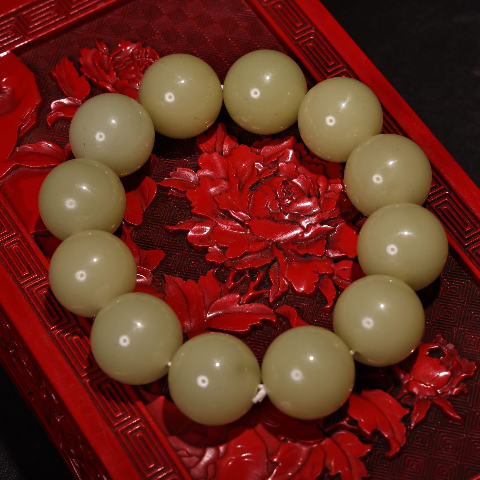 Embossed lacquerware box containing a jade bracelet. - 5