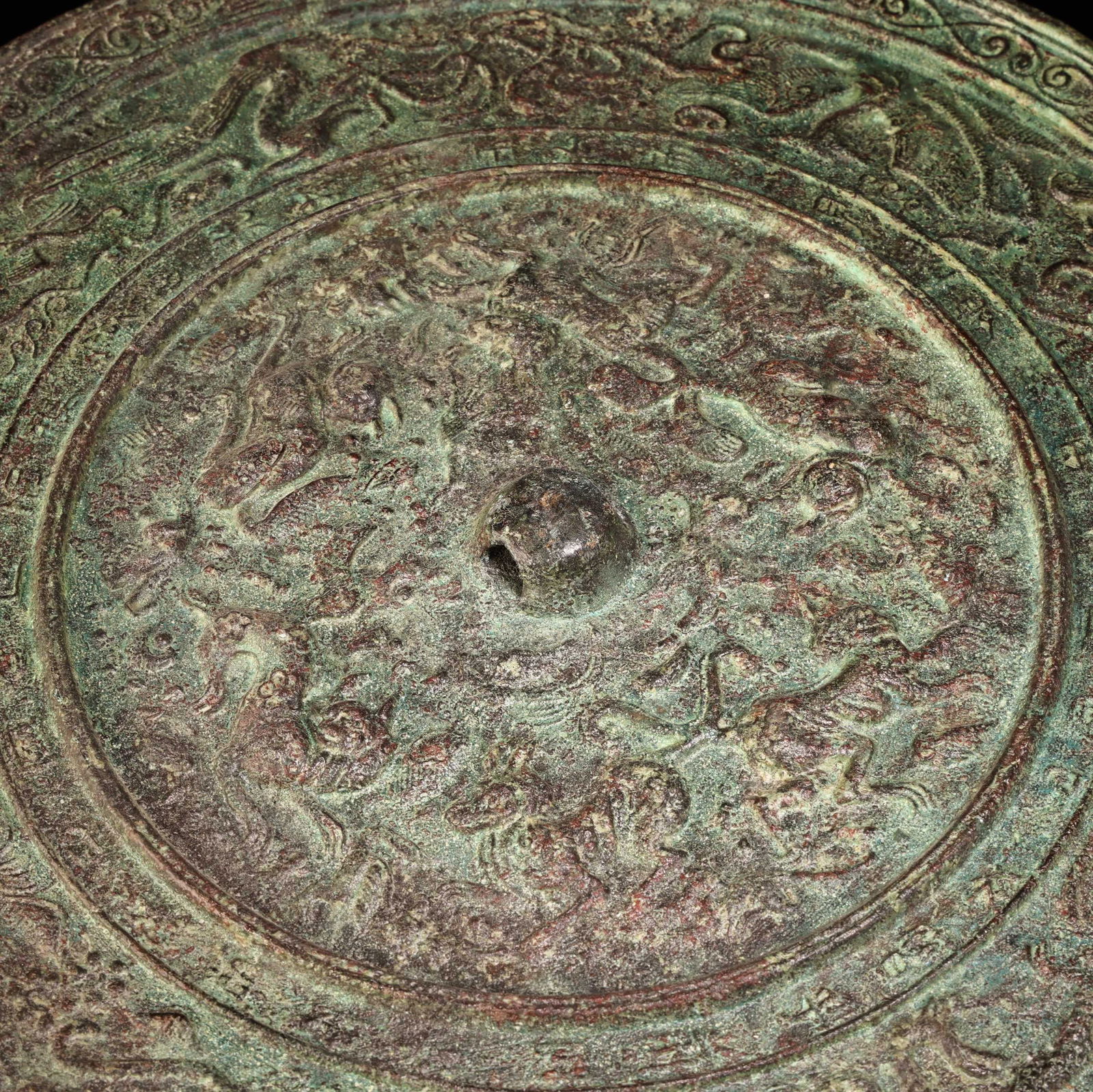 A bronze mirror. - 3