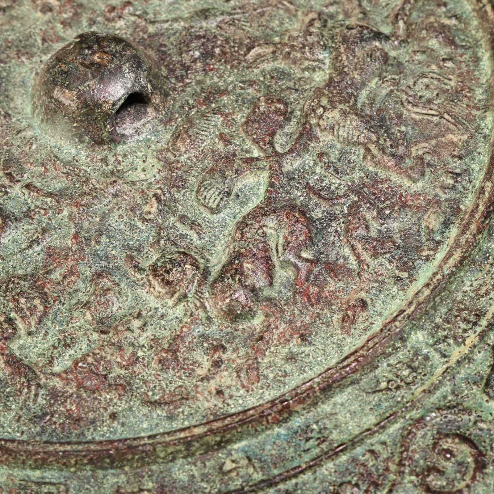 A bronze mirror. - 7