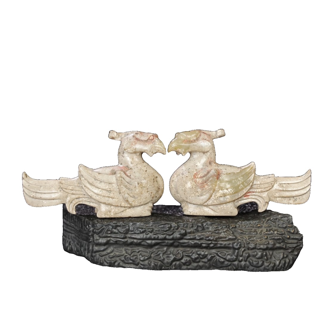 A pair of Hetian jade pendants with divine birds.: A pair of Hetian jade mythical birds from old Tibet, with delicate and smooth jade quality, aged patina, and detailed as shown in the picture. Dimensions are length 8.3 cm, width 5 cm, height 5 cm,