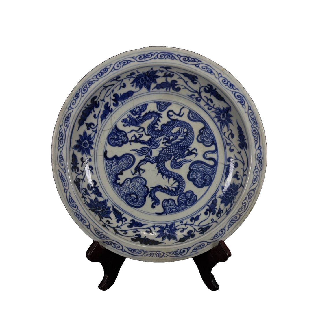 Blue and white porcelain plate with dragon pattern: This Yuan Dynasty blue and white dragon-patterned plate has a dignified shape, with a slightly curved rim and an outward flared foot, showcasing the elegant and stable characteristics of Yuan Dynasty