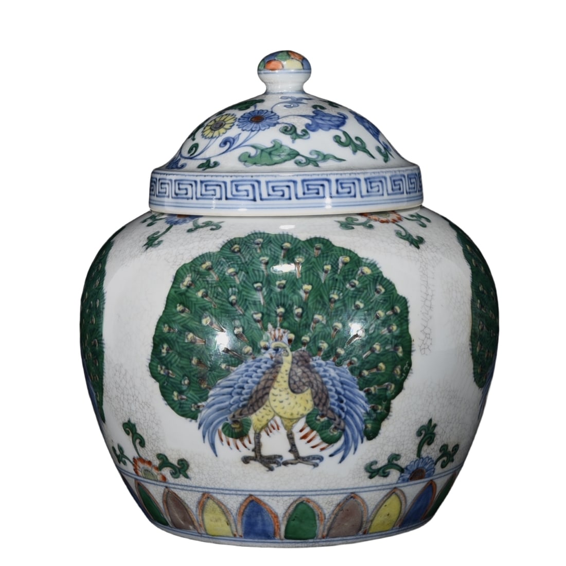 Ming Chenghua Doucai Peacock Feathers Unfolding Lid Jar: The Ming Chenghua Doucai Peacock Feathers Opened Lid Jar, with a total height of 26 centimeters and a diameter of 23 centimeters, has a dignified and solid shape, full and plump cheeks. The jar is gla