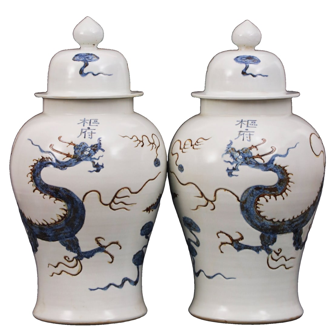 A pair of Yuan Dynasty blue and white generals' jars with underglaze red dragon design. (1 of 10)