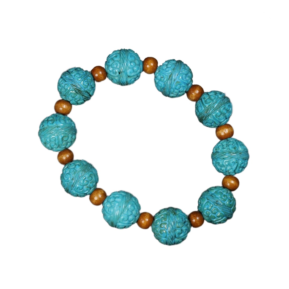Turquoise bracelet: Turquoise bracelet, with aged patina, measuring 1.5 centimeters in diameter and weighing 76.3 grams.