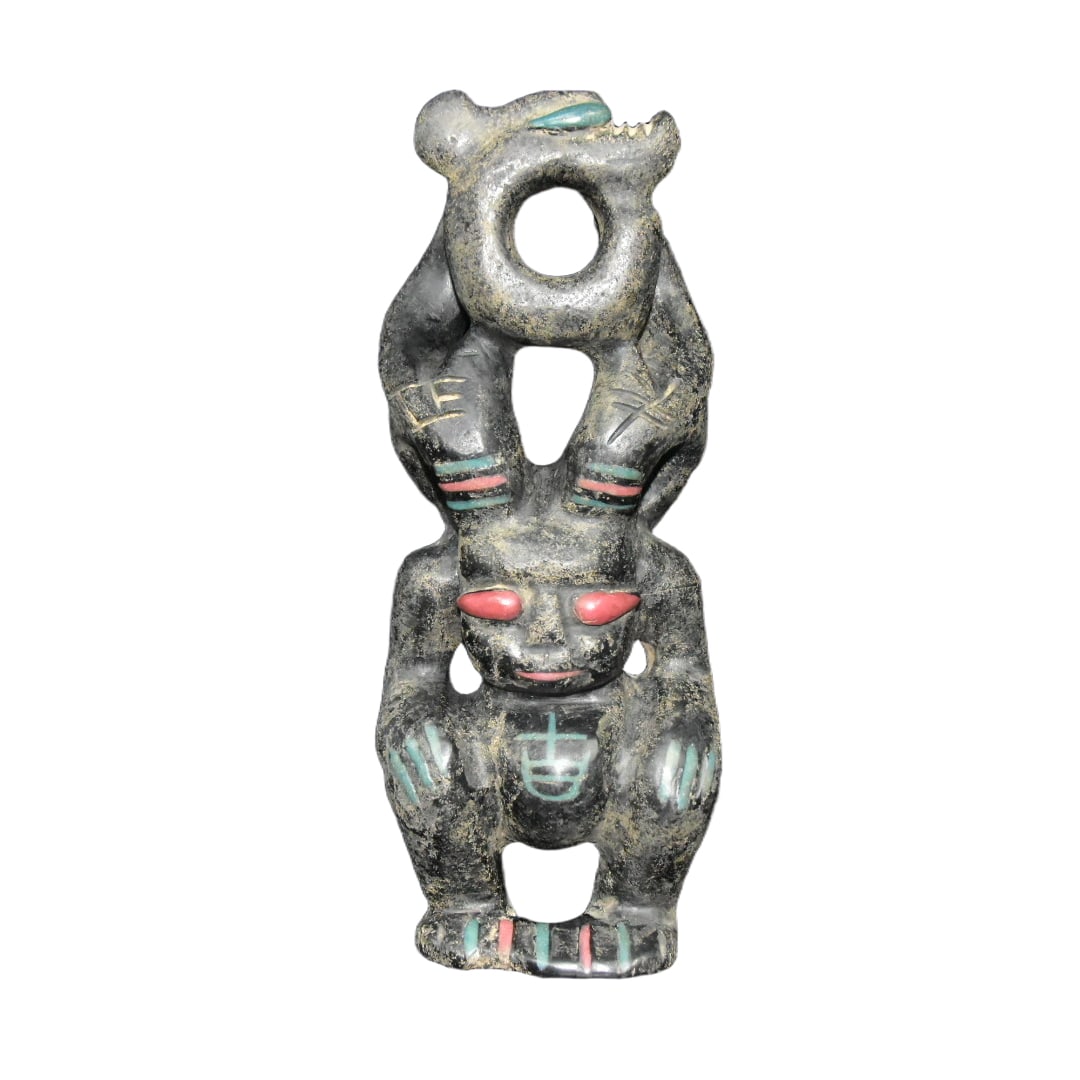 Meteorite Sun God: This meteorite with a unique sun god shape features a towering vessel form, embodying the solemnity and mystery of sun god worship. The rough and vivid decorations depict distinct facial features and