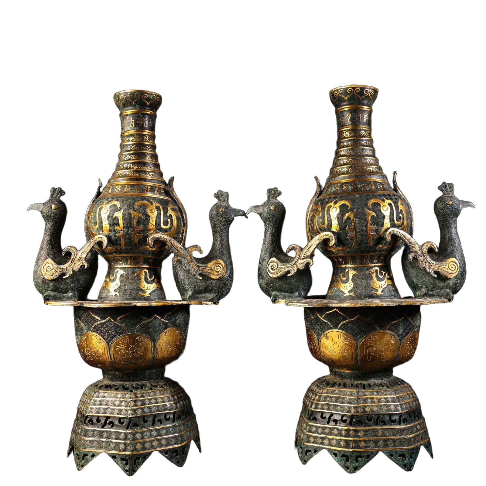 A pair of bronze candlesticks with gold inlay. (1 of 19)