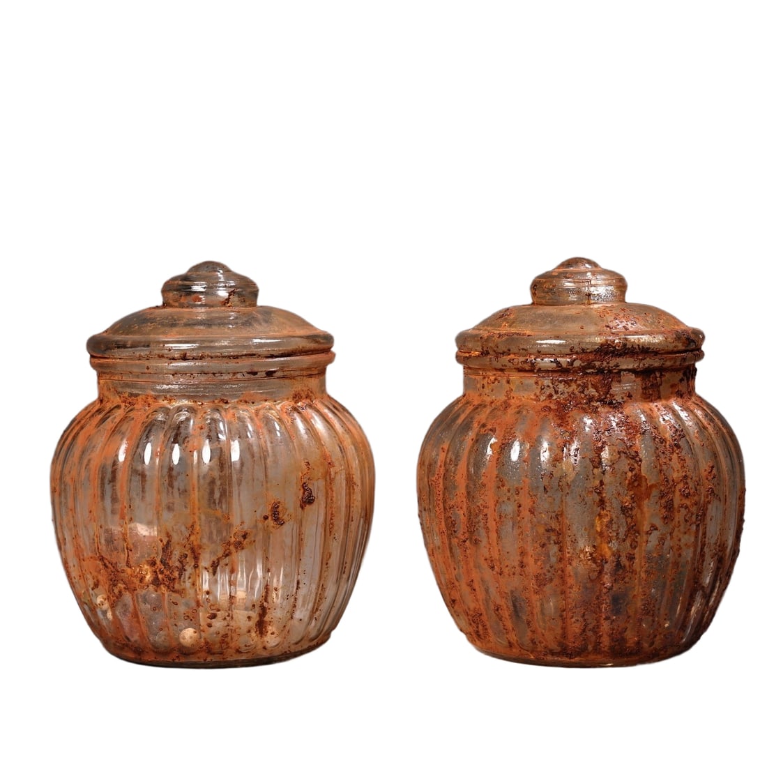 A pair of glass relic jars.: A pair of glass relic jars.