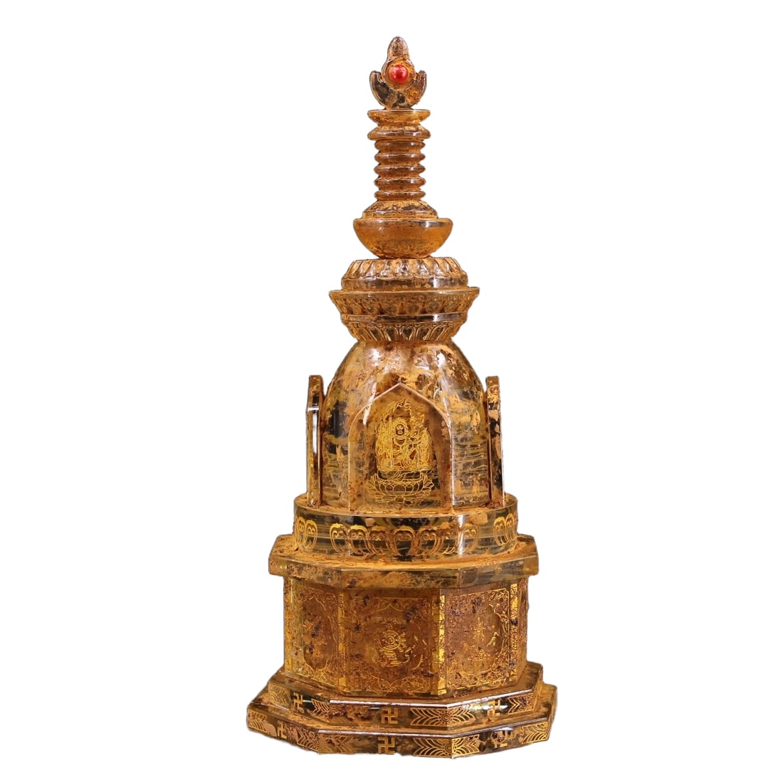 Old crystal carving of a gilded pagoda with eight treasures.: Old crystal carved with gilded eight treasures stupa, weighing 2178 grams, 28 centimeters in height, 12 centimeters in width.